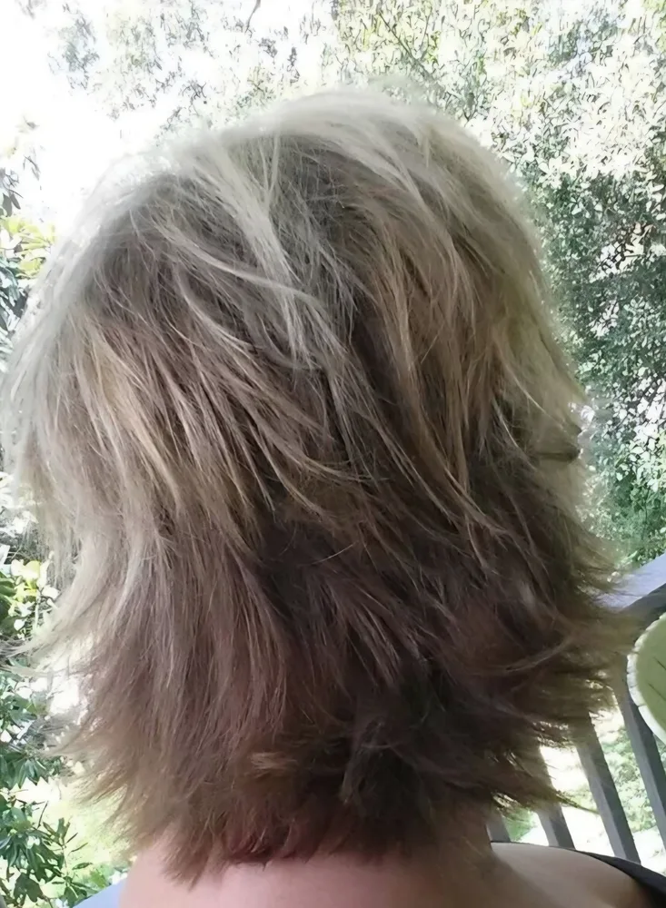 Hair styled by Henny at KC Clippers Salon