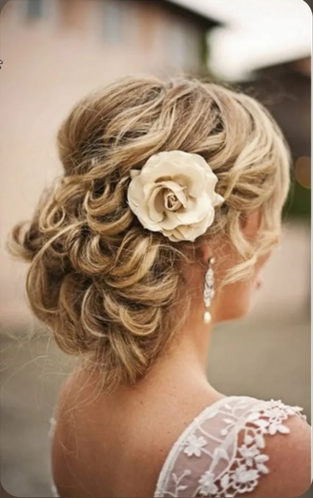 Hair styled by Henny at KC Clippers Salon